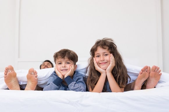 Kids in parents bed_15%